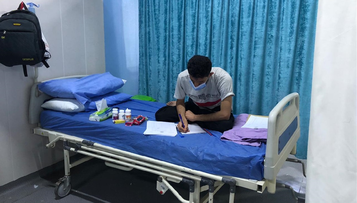 In Karbala, a corona-infected student performs his exams