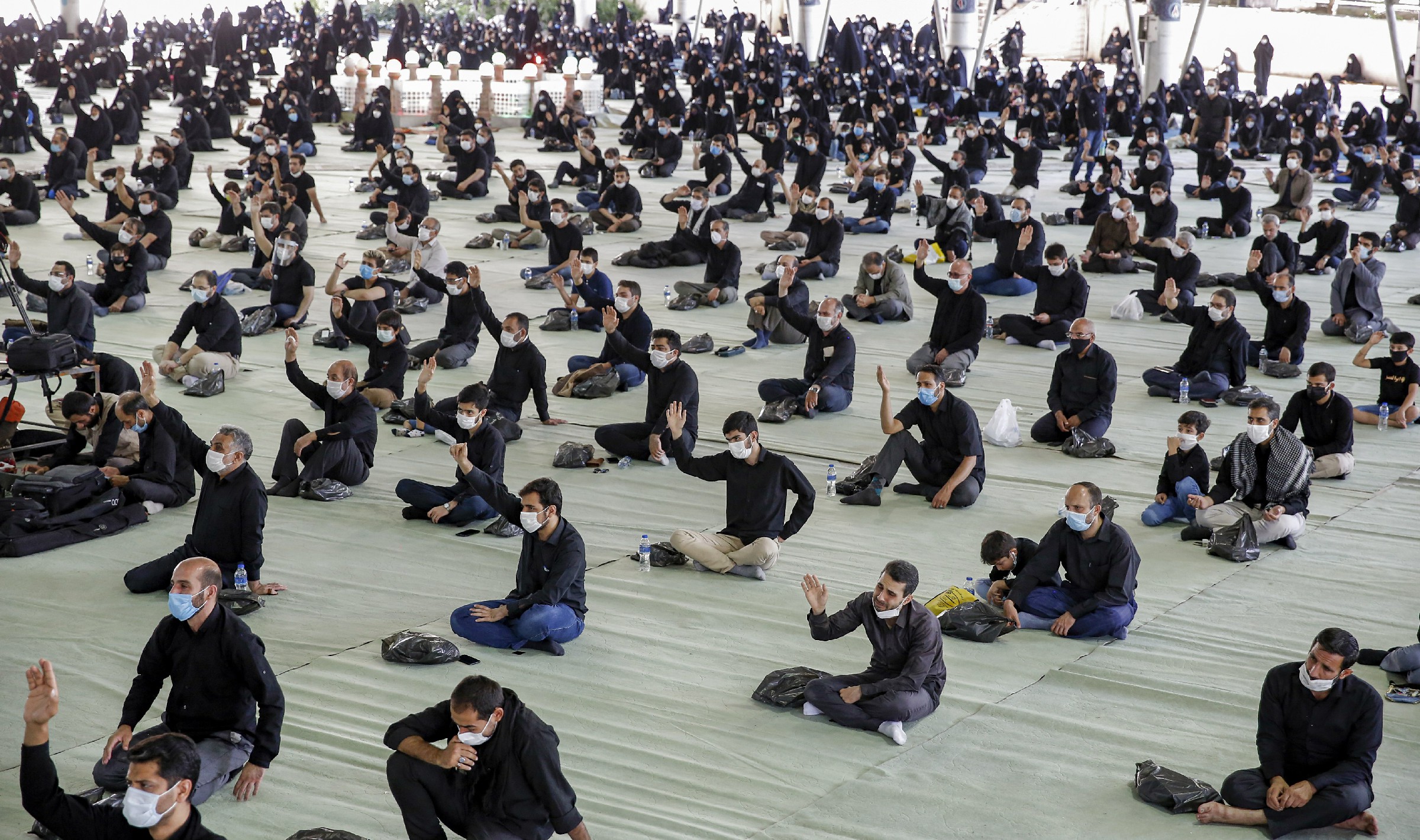 Masks and Tears: Muslims Mark Ashura at Iraq Shrines despite Virus