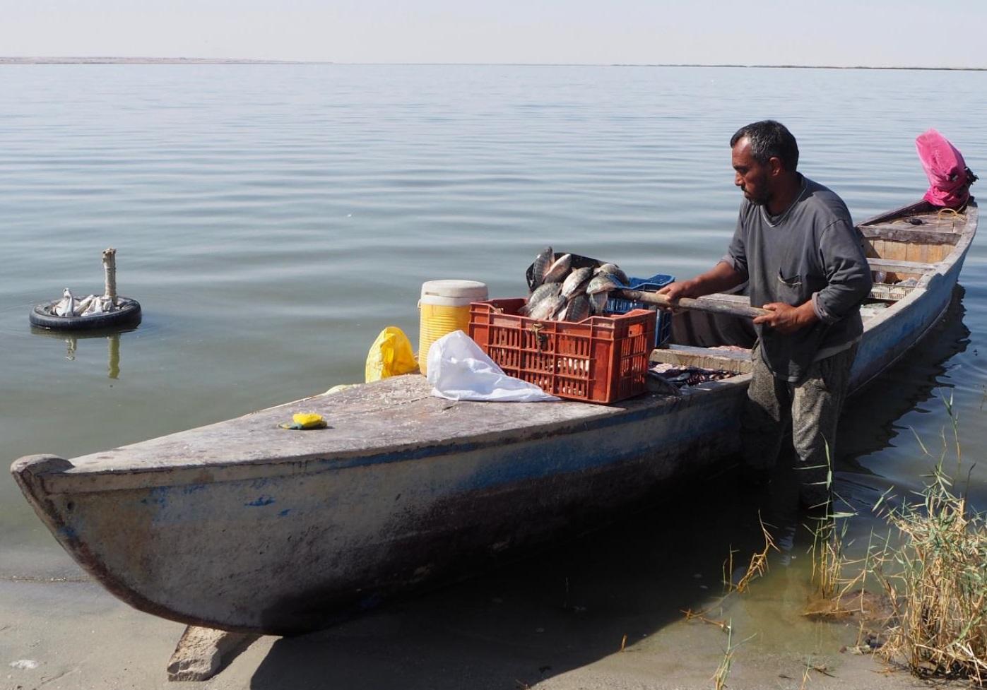Fishermen fear shrinking Karbala's Lake Razzaza spells an end to their livelihoods